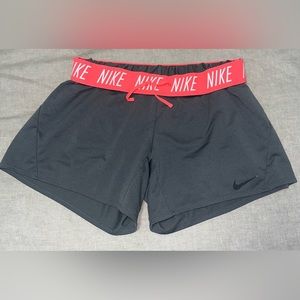 Nike medium gray with neon pink band women’s shorts